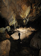 Caver in a cave, Pugnetto, Mezzenile, Piedmont, Italy