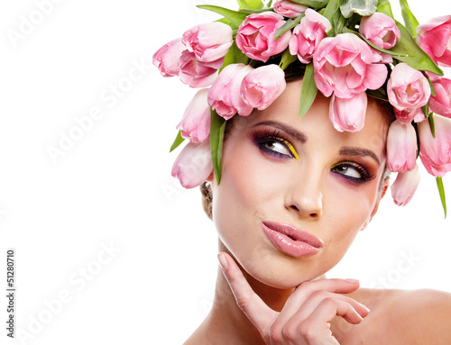 Photo: beauty woman portrait with wreath from flowers on head over whit beauty woman portrait with wreath from flowers on head over whit