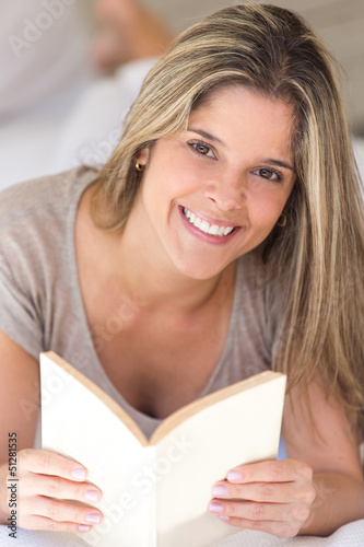 Photo: Woman ralaxing with a book Woman ralaxing with a book