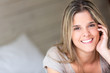 Portrait of a beautiful woman at home smiling