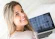 Woman using her laptop at home