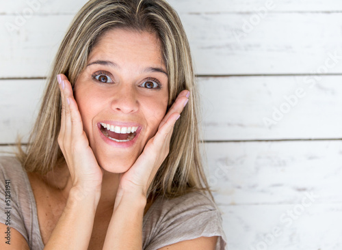 Photo: Woman looking surprised Woman looking surprised