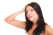 Latin woman suffering from headache