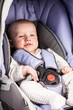 Cute little boy in car seat