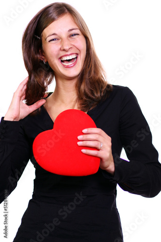 Photo: Young woman holding a heart Young woman holding a heart
