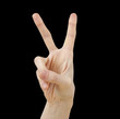 White hand on black
