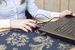 Female hands using computer