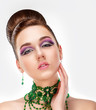 Sensual Brunette with Purple Eye Make-up and Jewelry. Glamor
