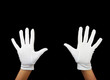 Foto: hands are showing ten fingers against black background hands are showing ten fingers against black background