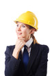 Photo: Young businesswoman with hard hat on white Young businesswoman with hard hat on white