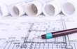 Architect blueprints and rolls background