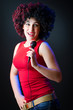 Female performer at disco with mic