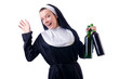 Nun with bottle of red wine