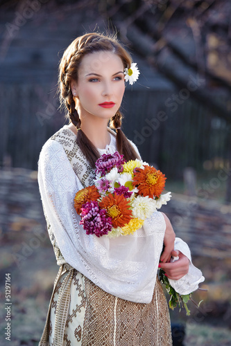 Photo: beautiful woman with traditional costume beautiful woman with traditional costume
