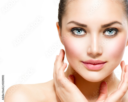 Photo: Beauty Portrait. Beautiful Spa Woman Touching her Face Beauty Portrait. Beautiful Spa Woman Touching her Face