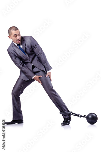 Photo: Businessman with shackles on white Businessman with shackles on white