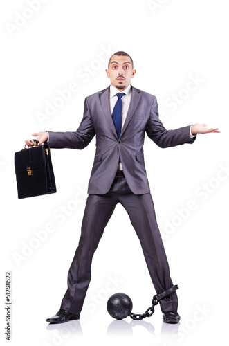 Photo: Businessman with shackles on white Businessman with shackles on white