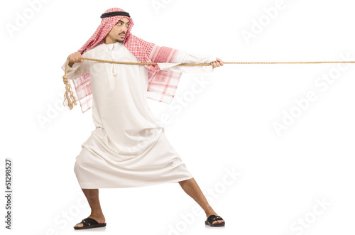 Photo: Arab man in tug of war concept Arab man in tug of war concept