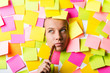Businesswoman with lots of reminder notes