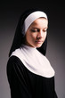 Young nun in religious concept