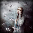 Inspiration. Woman with Flying Origami Swans in Mystic Forest