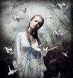 Romantic Blonde with Hovering Origami Birds in Spooky Forest
