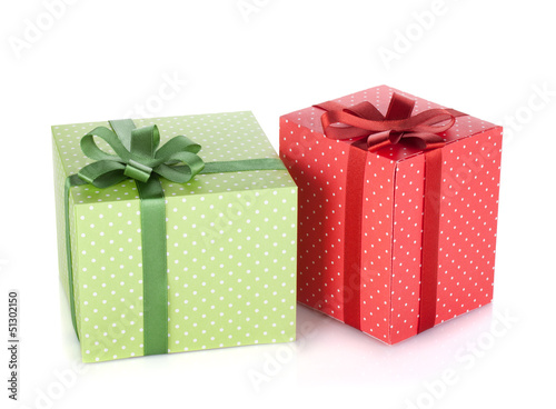 Photo: Two gift boxes with ribbon and bow Two gift boxes with ribbon and bow