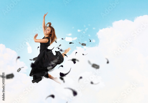 Photo: Young girl floating Young girl floating