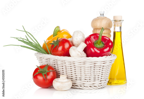 Photo: Fresh vegetables and mushrooms with olive oil and pepper shaker Fresh vegetables and mushrooms with olive oil and pepper shaker