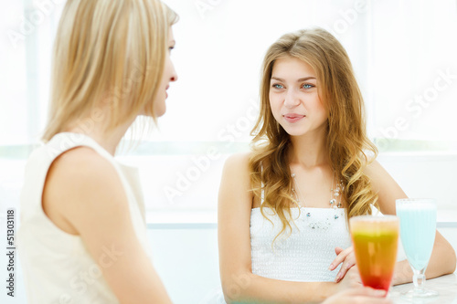 Photo: Young woman with a glass of drink Young woman with a glass of drink