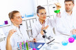 Team of scientists working in laboratory