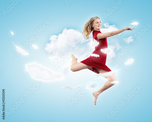 Photo: Young girl floating Young girl floating
