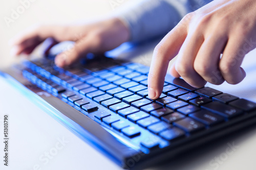 Photo: Click! Hands of a man on keyboard Click! Hands of a man on keyboard
