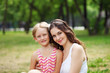 Mother and daughter in the park