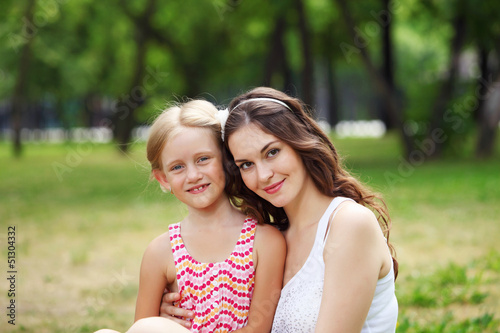 Photo: Mother and daughter in the park Mother and daughter in the park