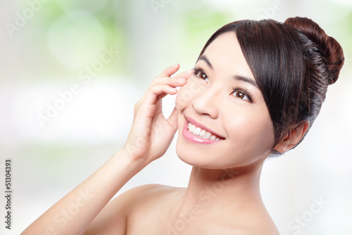 Photo: Beautiful woman smile face with clean face skin Beautiful woman smile face with clean face skin