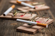 Cigarette in mousetrap