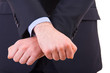 Businessman showing jail gesture with his hands.