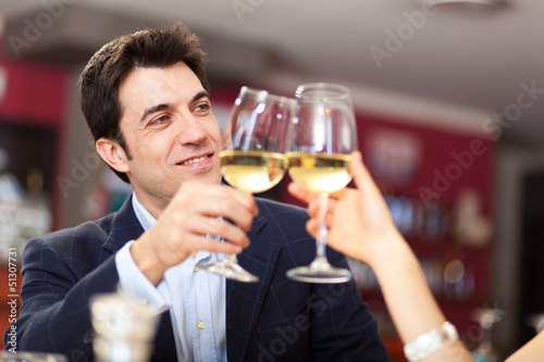Photo: Couple having a romantic dinner in a restaurant Couple having a romantic dinner in a restaurant