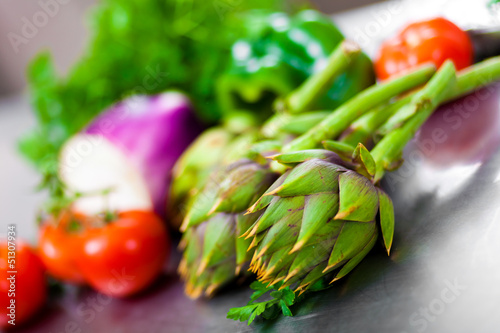 Photo: A selection of vegetables on a kitchen's table A selection of vegetables on a kitchen's table