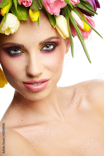 Photo: beauty woman portrait with wreath from flowers on head over whit beauty woman portrait with wreath from flowers on head over whit