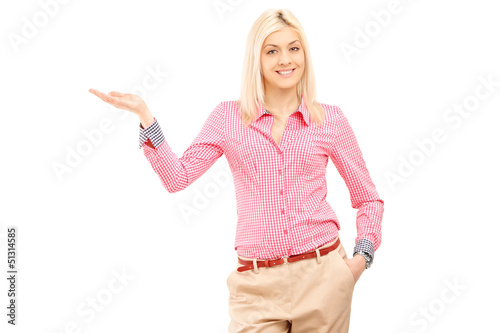 Photo: Smiling woman gesturing with hand Smiling woman gesturing with hand