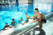 happy children group  at swimming pool