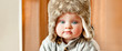 baby in winter fur hat