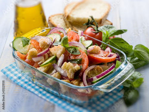 Photo: panzanella traditional tuscany salad, selective focus panzanella traditional tuscany salad, selective focus