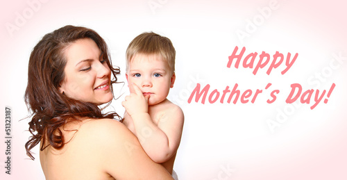 Photo: Young mother with a charming baby on white background Young mother with a charming baby on white background