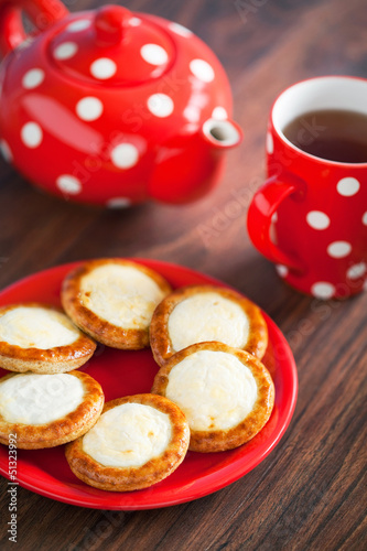 Photo: Open mini pies with cottage cheese, selective focus Open mini pies with cottage cheese, selective focus