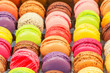 traditional french colorful macarons in a rows in a box