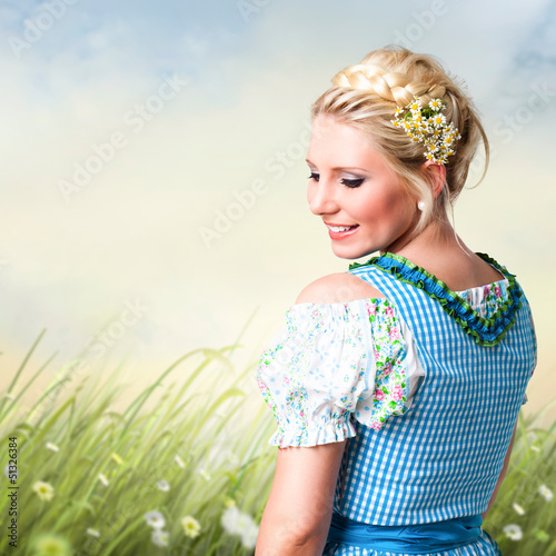 Photo: attraktive blonde Frau im Dirndl attraktive blonde Frau im Dirndl