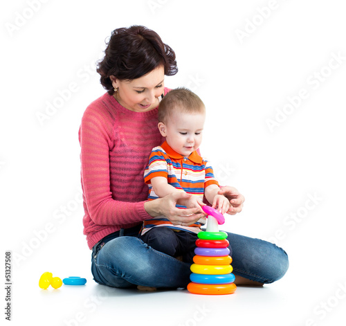 Photo: baby boy and mother playing together baby boy and mother playing together